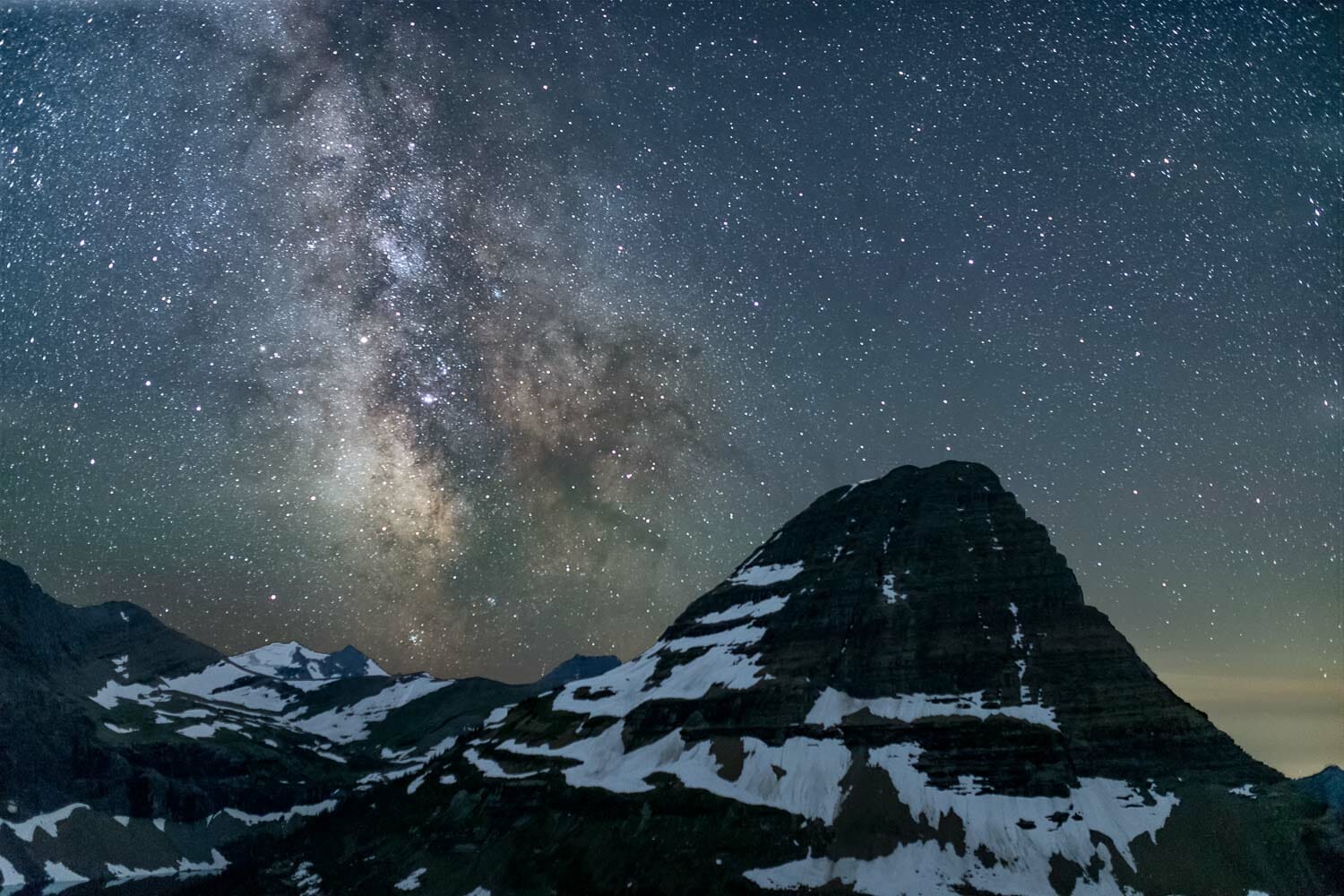 Milky Way shines over Raynolds Mountain in Glacier National Park