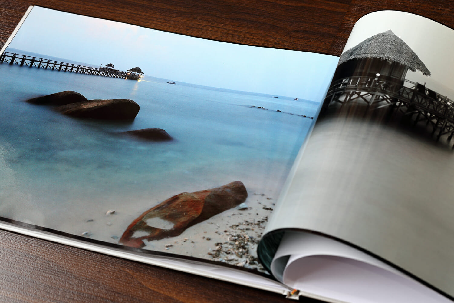 landscape photography magazine open on desk